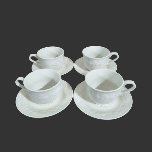 A Set of Tea Cups & Saucers